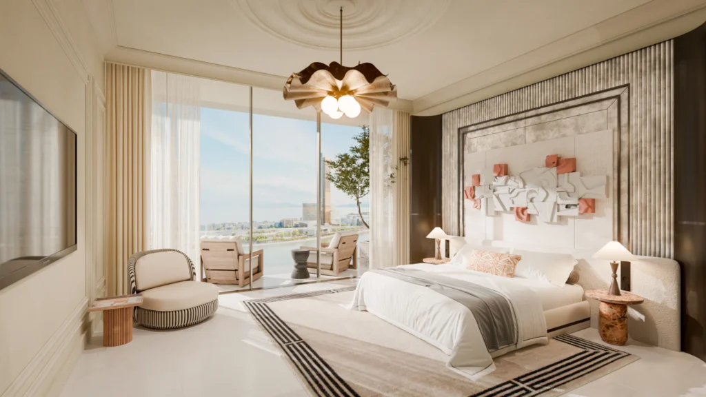 Luxury bedroom interior at Le Chateau by BEYOND with balcony and sea view in Ras Al Khaimah
